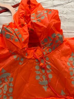 Free People Neon Orange Floral rain poncho packable
